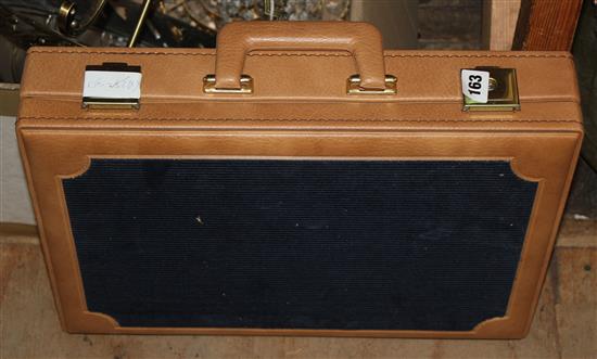 Gilt metal canteen of cutlery, contained in an attaché case